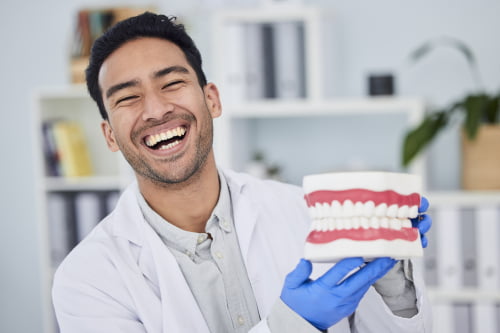 A cosmetic dentist consulting with a patient in a North York dental clinic about smile enhancement and aesthetic dental treatment.